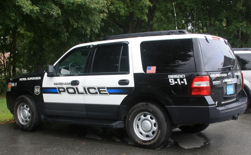 Town Administrator Mark Andrews traveled in a Police SUV with Wareham Community Television (WCTV) during the tropical storm, providing information about conditions and hazards live on television. BY JAIME REBHAN