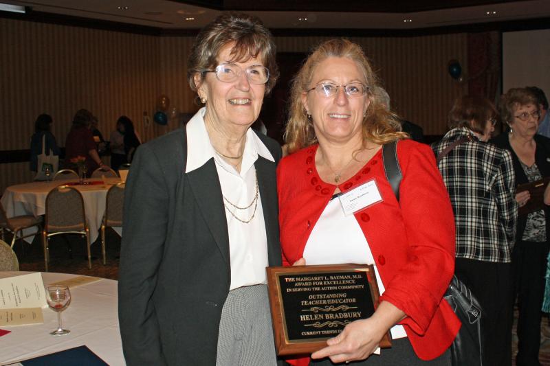 Helen Bradbury, President of the Christoper Donovan Day School in Wareham, recently received the prestigious Margaret L. Bauman Award for Excellence in Serving the Austism Community, Outstanding Teacher/Educator. In this photo, Dr. Bauman (left) congratulates Bradbury at a reception held for award recipients on Friday, April 29.