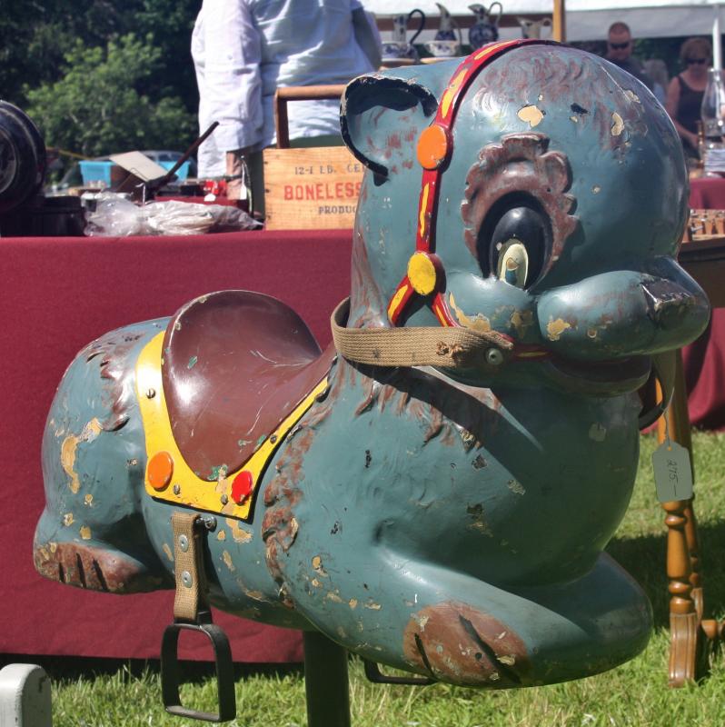 Sue Hartman of Hartman House Antiques in East Bridgewater says this playground toy is from the 1940s. BY JAIME REBHAN
