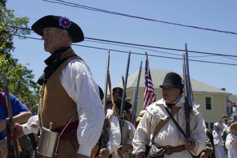 Howard Smith portrays the commander of the Wareham Militia and is backed by his militiamen. BY BILL WHELAN