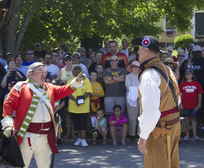 British Commander Steven Gardner exchanging words with the Wareham milita commander played by Howard Smith BY BILL WHELAN