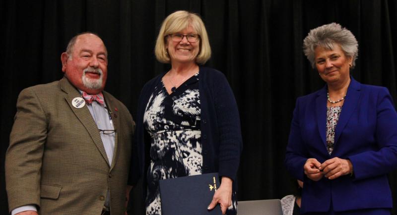 Superintendent Dr. Kim Shaver-Hood (right) and School Committee Chair Melvin Lazarus (left) present Nancy Cederholm with a certificate of recognition for her 20 years of service as a special education teacher at John W. Decas Elementary School. Principal Donna Noon described her as "flexible" and "active." BY ZARRIN TASNIM AHMED
