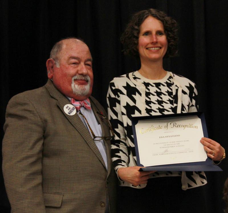 Lisa Ottaviano (right) has been a guidance counselor for 20 years at Minot Forest Elementary School. Here, she is being presented with a Certificate of Recognition by School Committee Chair Melvin Lazarus. BY ZARRIN TASNIM AHMED