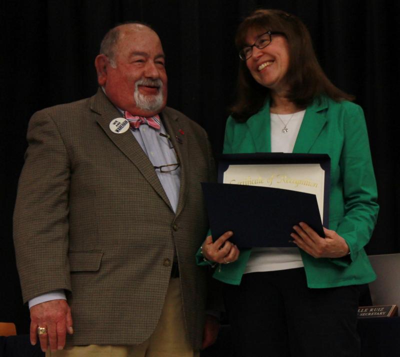Wareham High School's Colleen Kirby (right) was recognized for her 30 years of service as a teacher and presented an award by School Committee Chair Melvin Lazarus (left). In a statement she wrote, "I will always hold this community close to my heart." BY ZARRIN TASNIM AHMED
