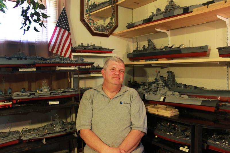 Captain John Charlebois sits in a room that houses each replica he's built over the years. BY ZARRIN TASNIM AHMED