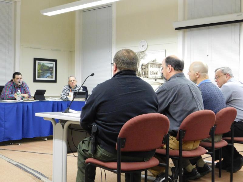 Town Harbormaster Garry Buckminster, Assistant Director of the Office of Fishing and Boating Access Doug Cameron, Mass EEA Public Access Coordinator Ross Kessler, and President of the League of Plymouth Sportsmen Paul Johnson present the proposed public access point to the Weweantic River at 0 Marion Road. BY ANDREA RAY