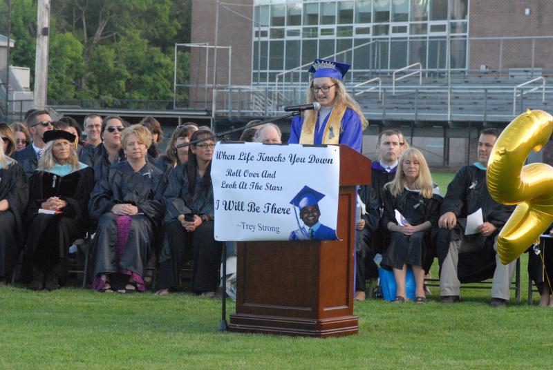 Salutatorian Sara Tyma admonishes her peers to thank those who helped them achieve their goals. BY LYDIA GOERNER