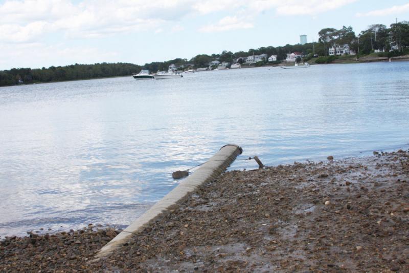 The drainage pipe that empties into East River Beach has been a source of consternation among Onset residents for six years. BY LYDIA GOERNER