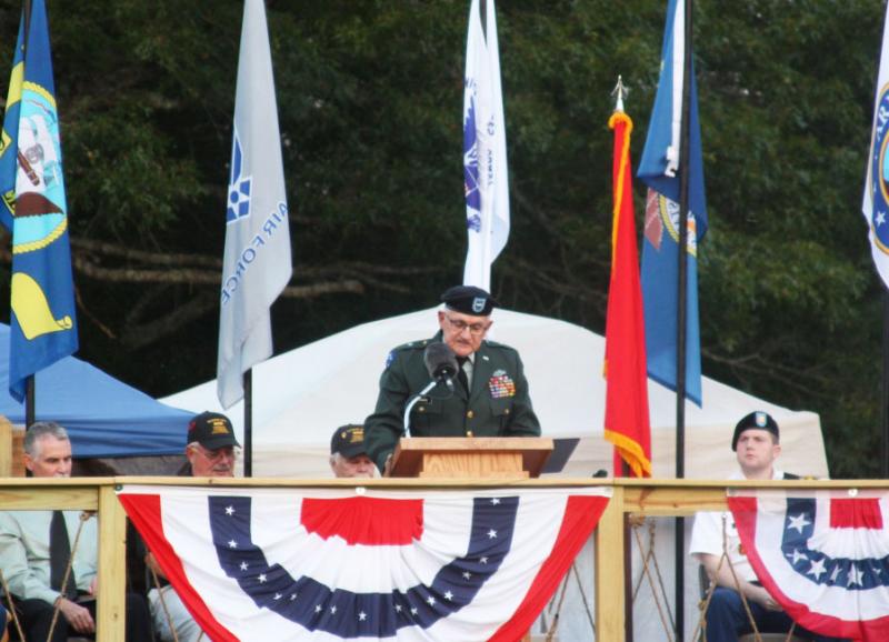 Brigadier General James Carpenter, the speaker on Saturday, said American patriotism "demands more of a citizen than taking off our hat when we hear the national anthem," but requires devotion to the country and "taking care of those who have taken care of us." BY LYDIA GOERNER