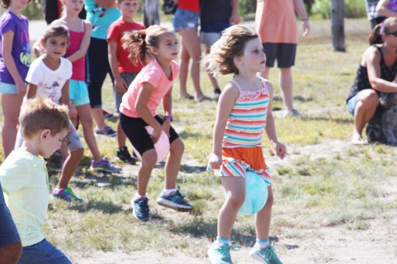 The kangaroo races must be completed with a rubber ball between participants' legs. BY LYDIA GOERNER
