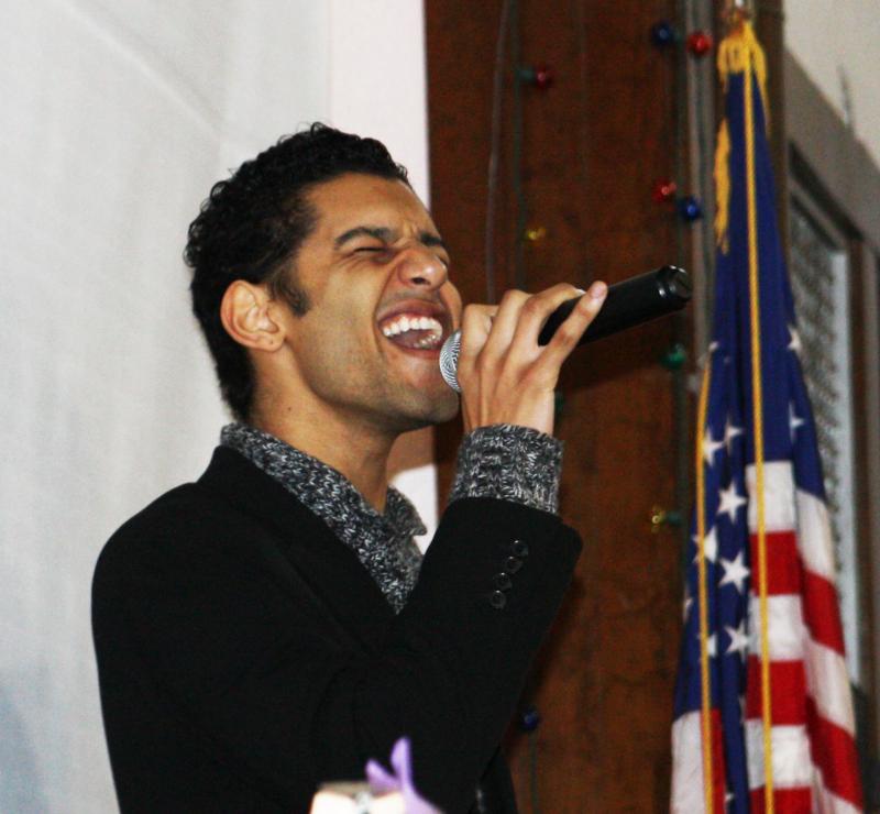 Wareham High School graduate Teddy Mathews belts out the national anthem before the breakfast begins. BY LYDIA GOERNER