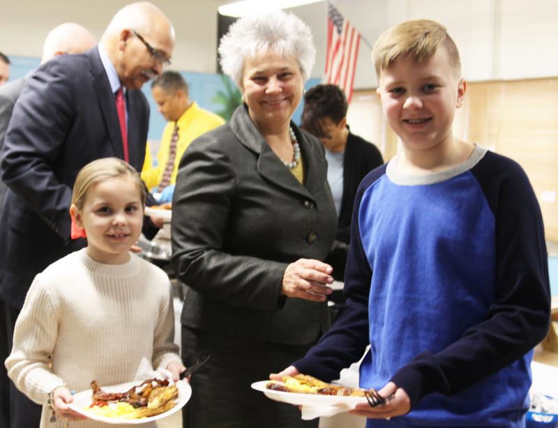 Wareham Public Schools Superintendent Kimberly Shaver-Hood grabs breakfast with her grandchildren, Morgan and Tyler Lee. BY LYDIA GOERNER