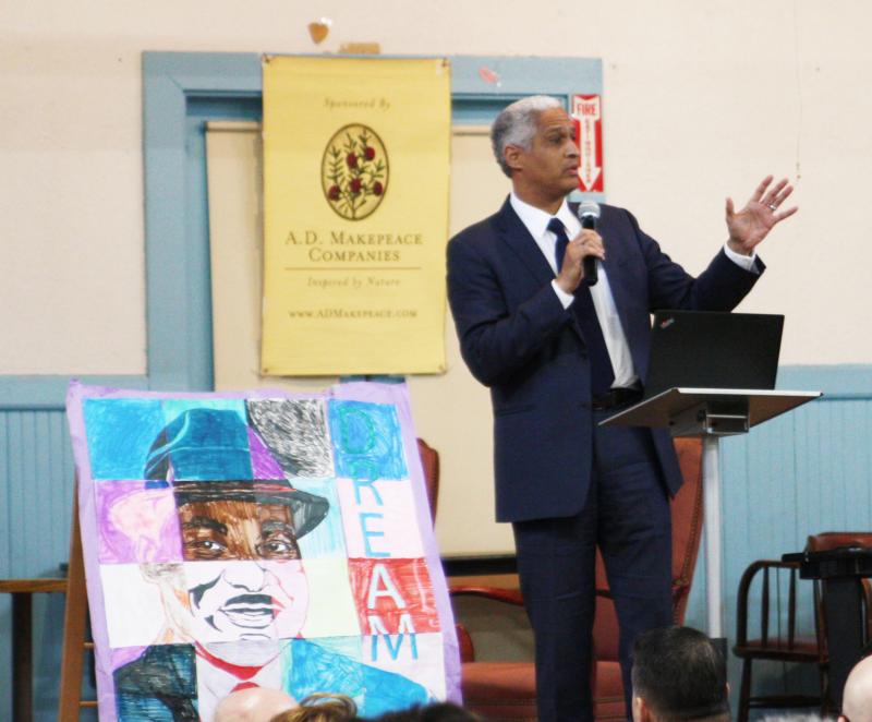 Edward Gomes gives the keynote address at the annual Martin Luther King Jr. Community Breakfast. BY LYDIA GOERNER