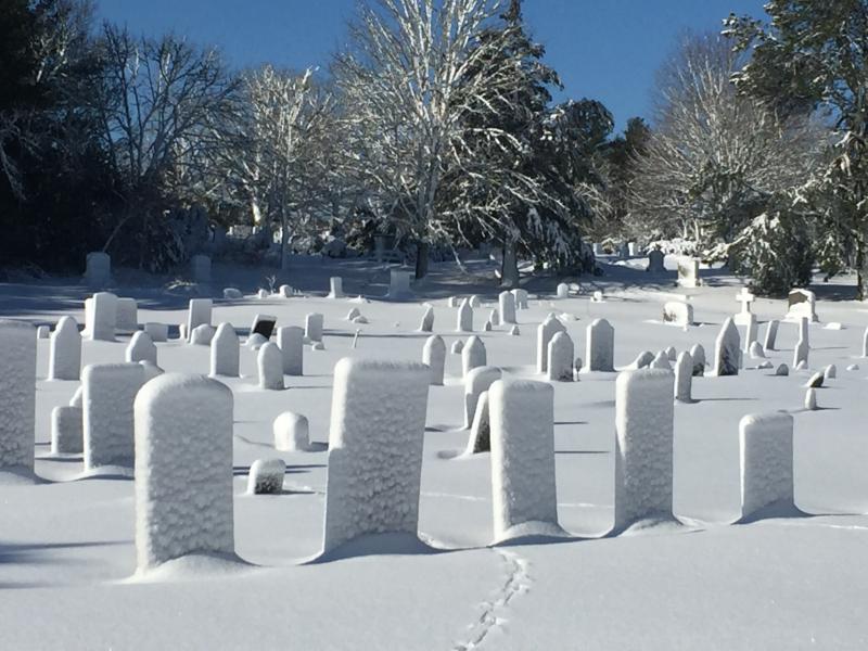Agawam Cemetery is covered in a heavy layer of snow on Wednesday after the snowstorm hit Wareham. BY ANDREW GRIFFITH