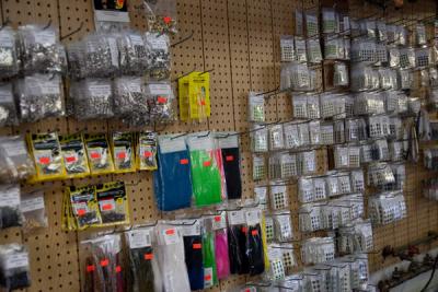 One wall of the shop is dedicated to lure "parts." Thomas said he is one of only three shos in the country that sells supplies for wooden lures or "plugs." Each winter, he hosts a Plug-Fest where luremakers bring their wares to trade. Last year, 300 builders attended. BY ANDREW W. GRIFFITH