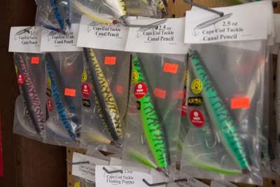 Thomas' lures are specially designed for the stripers that migrate through Cape Cod canal. This Memorial Day, Thomas said to expect 32-pound stripers. BY ANDREW W. GRIFFITH