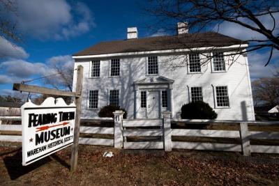 At Center Park, the trail heads down Elm Street past the Fearing Tavern. Originally built in 1690, with subsequent additions in 1765 and 1820, the building was the center of town business - both formal and informal - for many years, serving as tavern, stage coach stop, inn, and possibly even jail (if you can confirm this, let the Historical Society know!) although, they are certain that the stocks were set up outside the building to humiliatingly punish those who committed minor offenses such as swearing, and spitting. BY ANDREW W. GRIFFITH