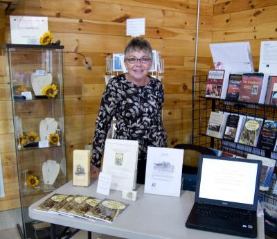Local author and historian Lynda Ames appeared at Tihonet Village Market this past weekend, discussing her book "In the Dark Woods of Wareham: Murder of the Egg Man." She will offer a presentation on Monday, September 20 to the Wareham Historical Society at 7 p.m. in the Old Methodist Meeting House. BY ANDREW W. GRIFFITH