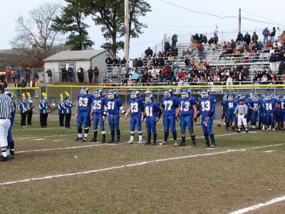 Seniors playing in their final game as Wareham Vikings watch the coin toss at the beginning of Thursday's game with Bourne. BY PATRICK LESTER