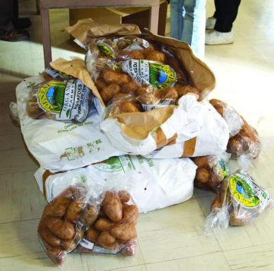 Organic potatoes were donated by John Sprouts Inc. of Rochester. All the food was donated by area businesses, church groups, and individuals. BY ANDREW W. GRIFFITH