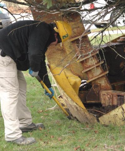 Landscapers shoveled extra dirt around the tree to stabilize it, but the hole so closely matched the shape of the root ball, that they used less than two wheelbarrows full of dirt. BY CYRUS MOULTON
