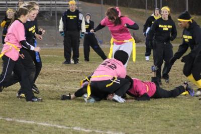Although the game was officially flag football, there were times when it seemed the girls would have preferred to play the traditional way. BY BARBARA THOMAS