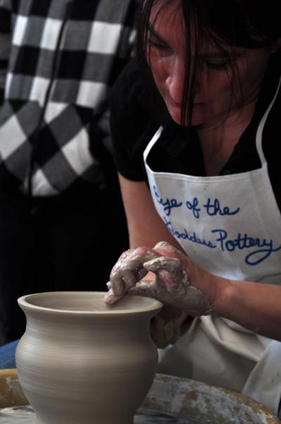 Christina Kunze, a 7th grade art teacher at Wareham Middle School, conducts a pottery demonstration. BY MATT CAMARA
