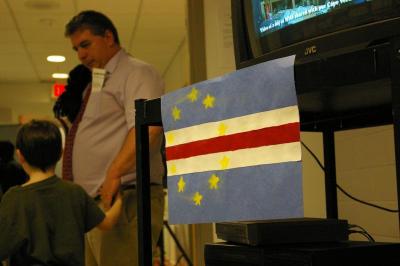 A paper flag of Cape Verde hangs underneath a video that Wareham Middle School (WMS) students made for their friends in Cape Verde about a "day in the life" of a WMS student. BY RISHI SIDHU