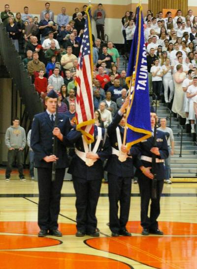 A pre-game ceremony while the audience listened to a riveting performance of the national anthem. BY RISHI SIDHU