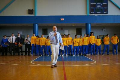 Vikings Head Coach Kevin Brogioli honors the varsity boys basketball team along with his assistant coaches during the rally. BY RISHI SIDHU