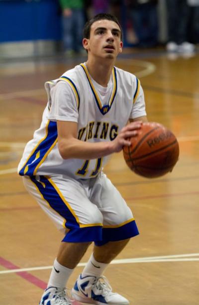 Senior Stefan Monteiros calmly sinks two free throws in Wareham's Tuesday night victory. BY ANDREW W. GRIFFITH