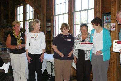 Members of the Friends of the Wareham Free Library and the Spinney Memorial Library accept a $5,905 award to help the Spinney Library become a part of the SAILS library network, a consortium of libraries in southeastern Massachusetts that shares resources and books with each other. BY RISHI SIDHU