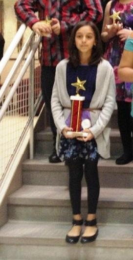 Minot Forest Elementary School 5th grade student Renneanna Dillen won 1st place in the 5th grade poster category of the Massachusetts Agression Reduction Center's Bullying Awareness Awards Ceremony held at Bridgewater State University on May 1. COURTESY CHRISTINE QUIMBY