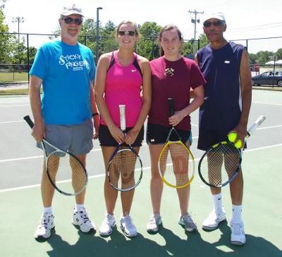 Program volunteers, from left to right: Steve Ford, Sydney Holmes, Alexa Holmes, and Jim Roberts. BY RISHI SIDHU