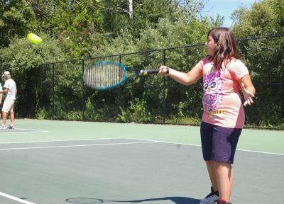 Artemis Sivvianakis, who will be going into the 5th grade at Decas Elementary School, hits the ball during the practice. BY RISHI SIDHU