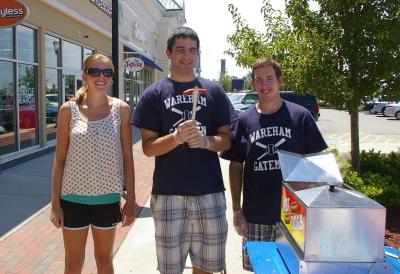 Gatemen interns hold down the fort at the free hot dog stand. The free hot dogs featured relish, mustard, and oh-so-delicious-never-leave-home-without-it ketchup. BY RISHI SIDHU