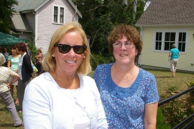 Cathy Anderson, left, and Janis Fuller are former girl scouts who used the Spinney Memorial Library when younger. BY RISHI SIDHU