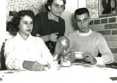A picture of the Pezzoli family taken by a reporter the morning after the shooting. From left to right, daughter Jeannie Pezzoli, wife Alice Pezzoli, and son, Raymond Pezzoli Jr. COURTESY JEANNIE PEZZOLI