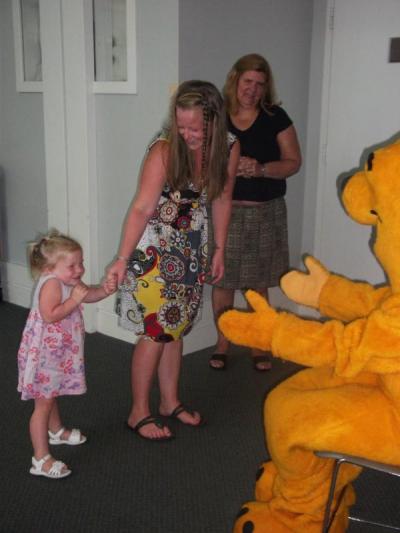 Getting a hug from Honey Bear at the Teddy Bear Picnic, August 9, at the Wareham Free Library. BY WAREHAM FREE LIBRARY