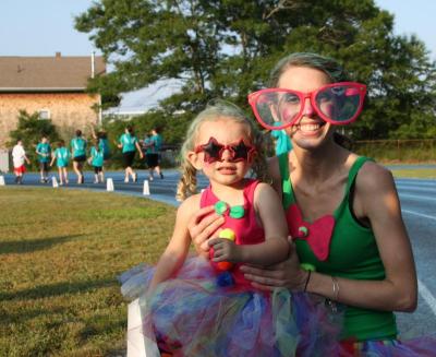 Addison Ponte, age 2, has been participating in Relay for Life "since she was in my belly," her mom, Krista McGee, right, says. The pair participates on the Party of Pontes team. BY JAIME REBHAN