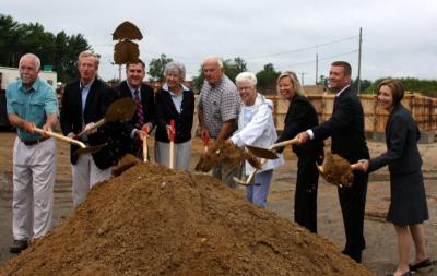 A.D. Makepeace Company representatives, along with State Rep. Susan Williams Gifford and Cape Cod Five president and CEO Dorothy Savarese celebrate the groundbreaking. BY JAIME REBHAN