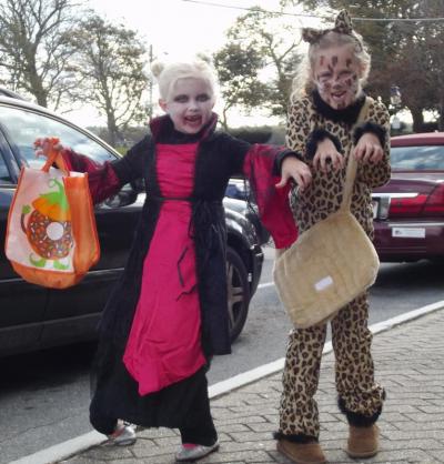 Ariana Viooatoro (left) is a vampire, while Simone Bruton is a ferocious cheetah. BY CAITLIN RUSSELL