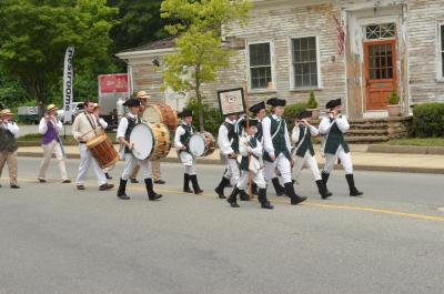 The Wareham Fife and Drum troupe were seen playing up and down Main St. as part of the weekend's celebration. BY NICK WALECKA