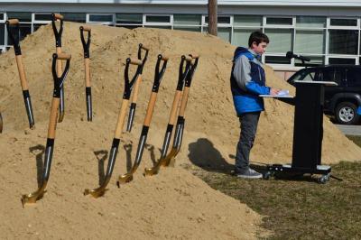 Niccolo Lembo-Volpe speaks during the groundbreaking ceremony of the new cranberry bogs at Wareham Middle School. BY SETH THOMAS