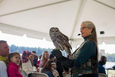 Marcia Wilson, of the Eyes on Owls duo, holds an owl, during a Birds of Prey demonstration. BY CAROLYN BICK