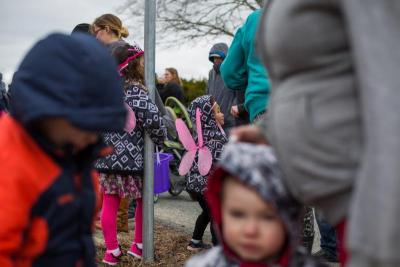 Ariyana Reyes, 3, back right, is decked out with wings, as she waits for the Easter egg hunt to begin. BY CAROLYN BICK