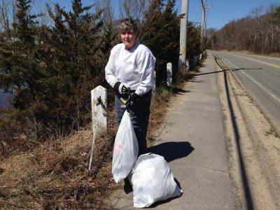 Selectman Judith Whiteside picked up trash along Narrows Road on Sunday, along with Selectmen Peter Teitelbaum and Alan Slavin, not shown in this photo. COURTESY DON'T TRASH WAREHAM