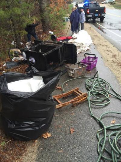 Team Buckminster cleaned up along Charge Pond Road, carrying out a grill and a full patio set among many other items. COURTESY DON'T TRASH WAREHAM