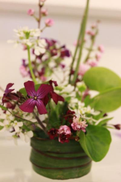 This small flower arrangement was created by Joyce Holster and won first place in "Dance of the Sugar Plum Fairy" small design division of Wareham Garden Club's Flower Show. She earned comments from judges praising her "beautiful choice of plant material" and "creative choices of color and container." BY ZARRIN TASNIM AHMED