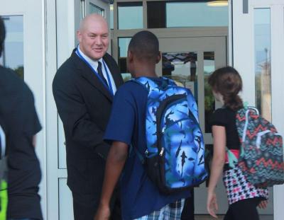 Principal Dr. Peter Steedman welcomes returning and new students to Wareham Middle School. BY ZARRIN TASNIM AHMED